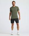 Man wearing Kelp Active Mesh Crew for a sporty look.
