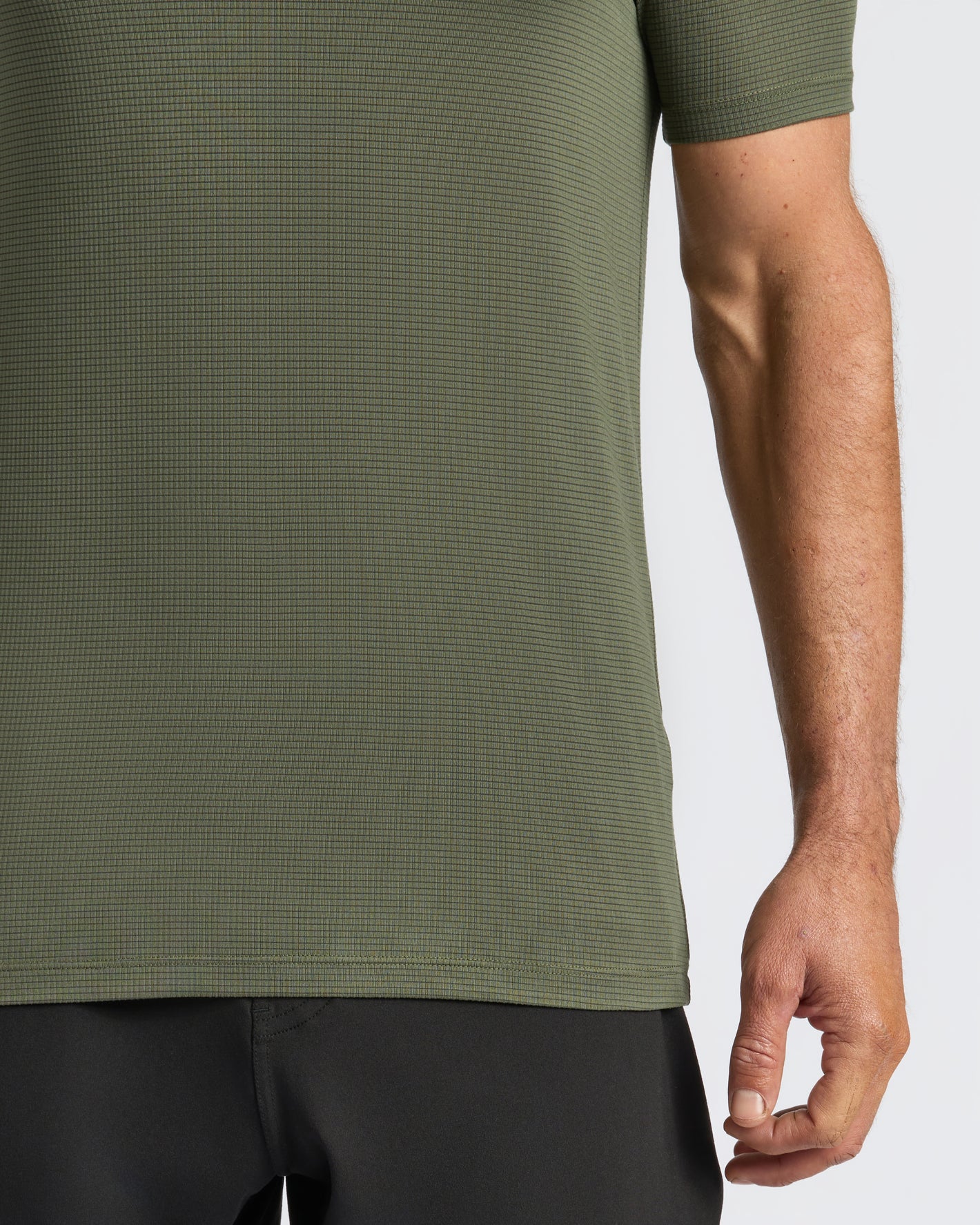 Kelp Active Mesh Crew on model, showcasing waffle texture and short sleeves.