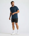 Man in Navy Active Mesh Crew 6-Pack, smiling, in workout attire.