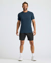 Man wearing Navy Active Mesh Crew 6-Pack shirt, smiling.