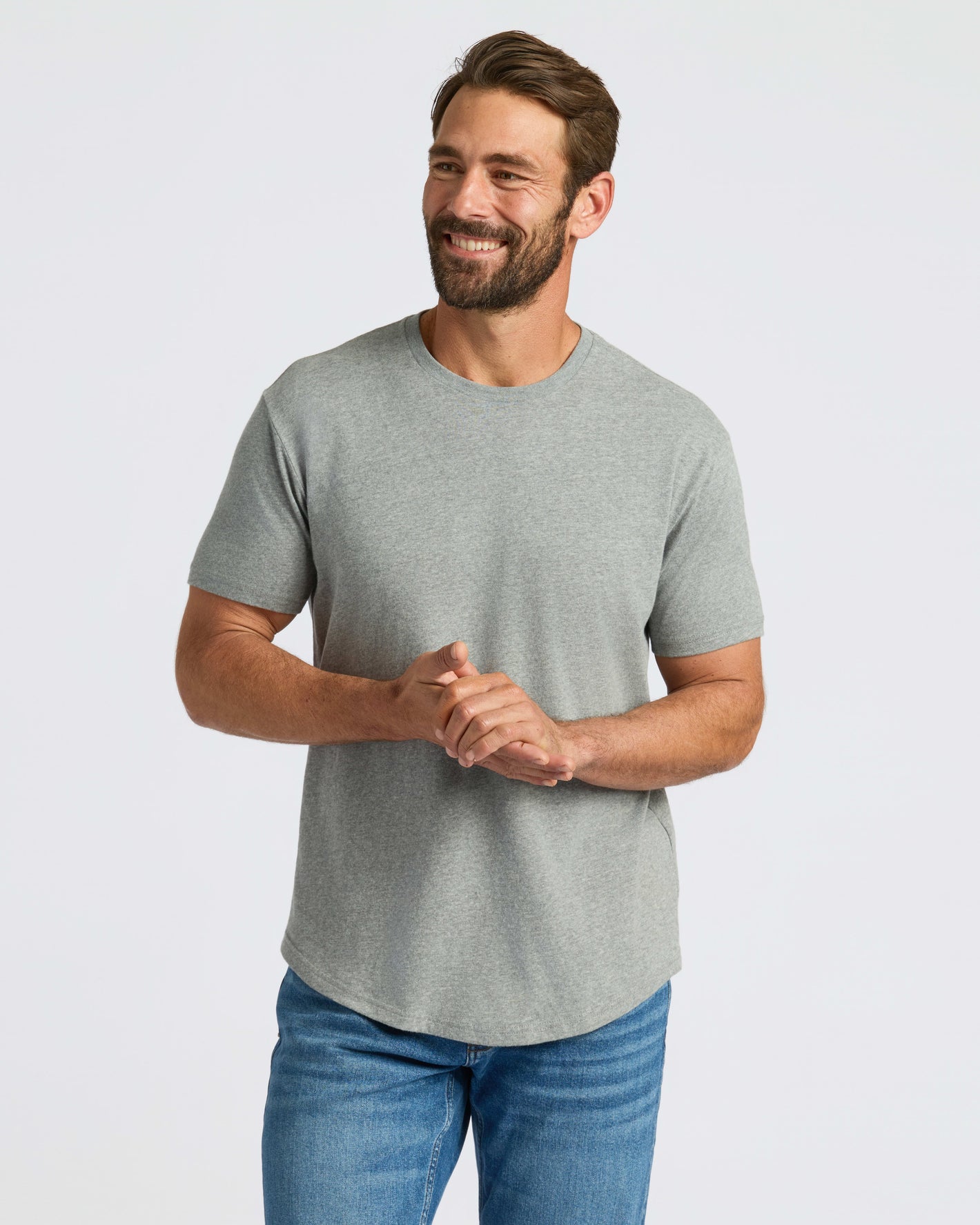 Heather Gray Curved Hem Classic Crew Neck on smiling male model.