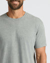 Heather Gray Curved Hem Classic Crew Neck on man, showcasing fit and style.