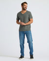 True Classic Men’s V-Neck T Shirt worn by smiling man, relaxed pose.