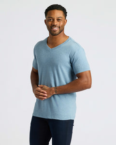 True ClassicMan wearing Classic V-Neck 10-Pack T-shirt, smiling, hands clasped.