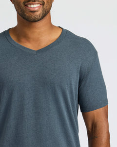 True ClassicMan wearing All White Classic V-Neck 10-Pack, smiling with stubbly beard.