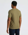 Man wearing True Classic Men’s V-Neck T Shirt, olive-green, short-sleeve, modern fit.