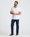 Man wears All White Classic V-Neck 10-Pack shirt.