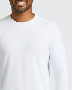 True ClassicSmiling person wearing a White Classic Long Sleeve Crew Neck shirt.