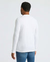 White Classic Long Sleeve Crew Neck 10-Pack on model's back, medium-blue jeans.