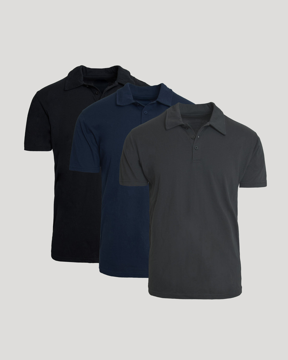 Three short-sleeve polo shirts in black, navy blue, and dark gray, arranged in a staggered overlapping display against a light gray background.