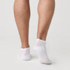 White Ankle Socks 3-Pack on feet, showcasing seamless design and fit.