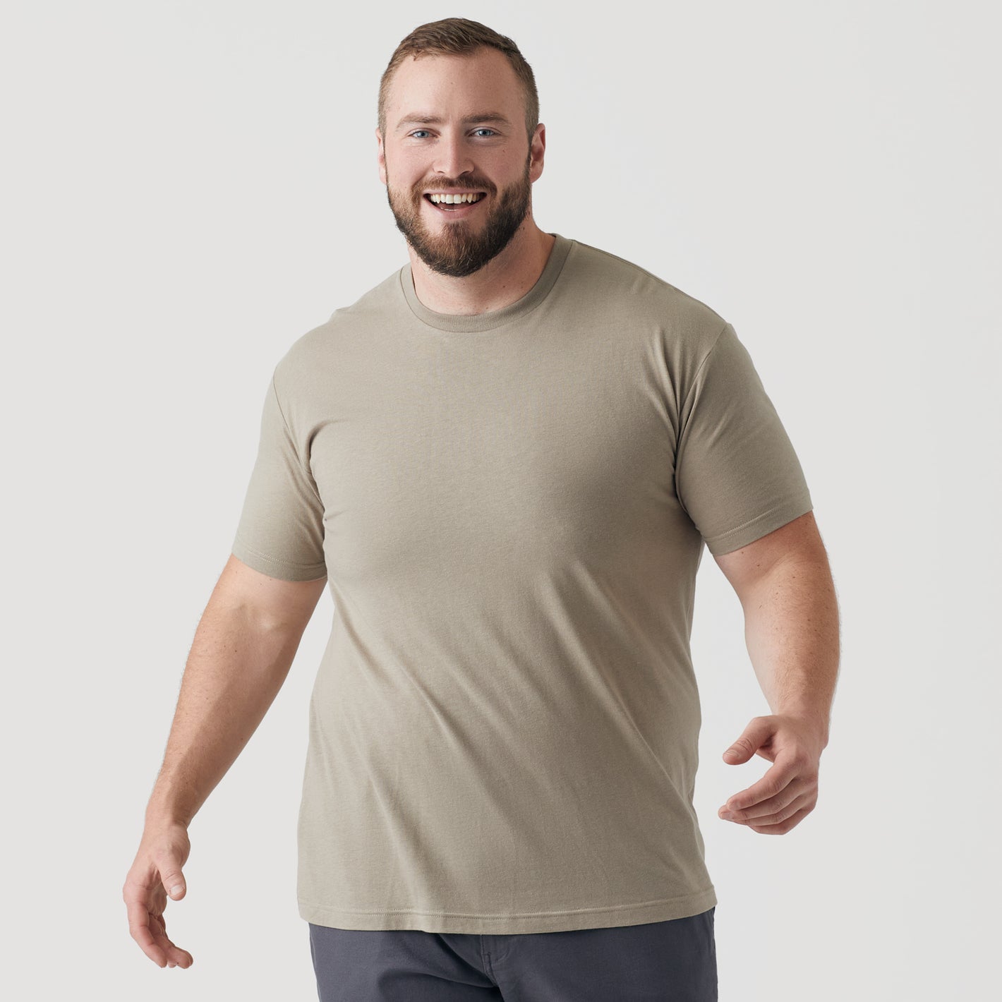 Military Beige Short Sleeve Crew Neck Tee on smiling man.