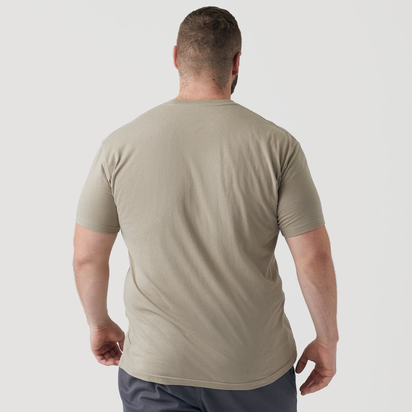Back view of man wearing Military Beige Short Sleeve Crew Neck Tee.