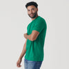 Man wearing Kelly Green Short Sleeve Crew Neck Tee.