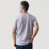 Man wearing Lilac Gray Short Sleeve Crew Neck Tee, back view.