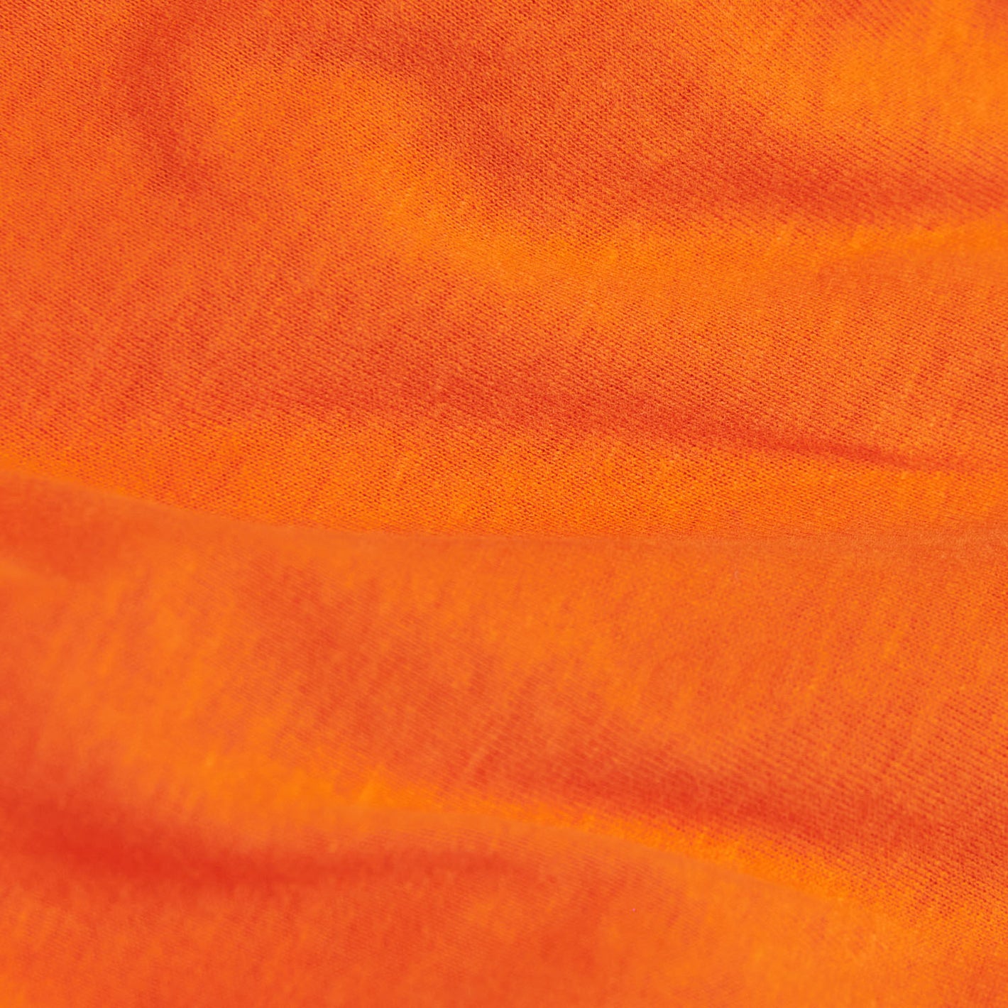 Orange Short Sleeve Crew Neck Tee's woven fabric in close-up detail.