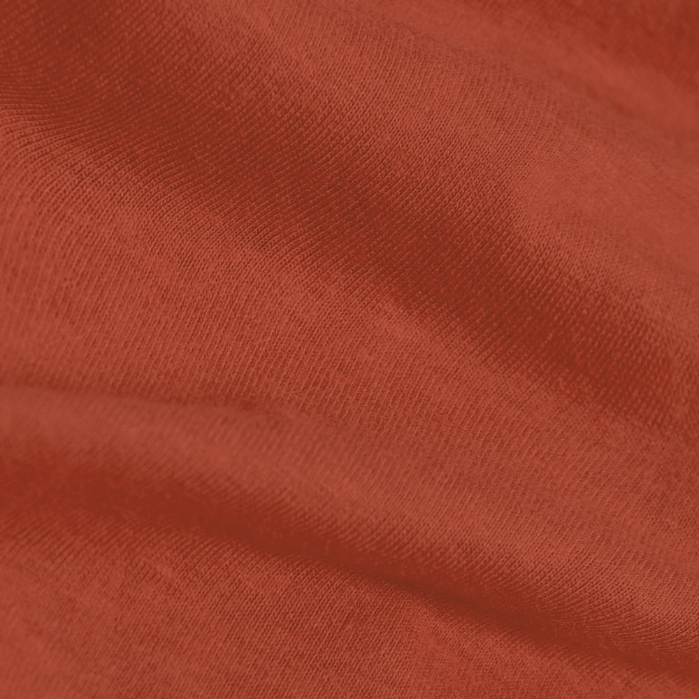 Rust Short Sleeve Crew Neck Tee with knit texture and gentle fold.