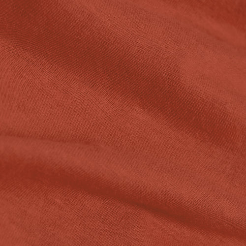 Rust Short Sleeve Crew Neck Tee with knit texture and gentle fold.