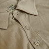 Military Beige Short Sleeve Polo collar and button placket close-up.