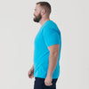 Turquoise V-Neck Tee on man in profile.
