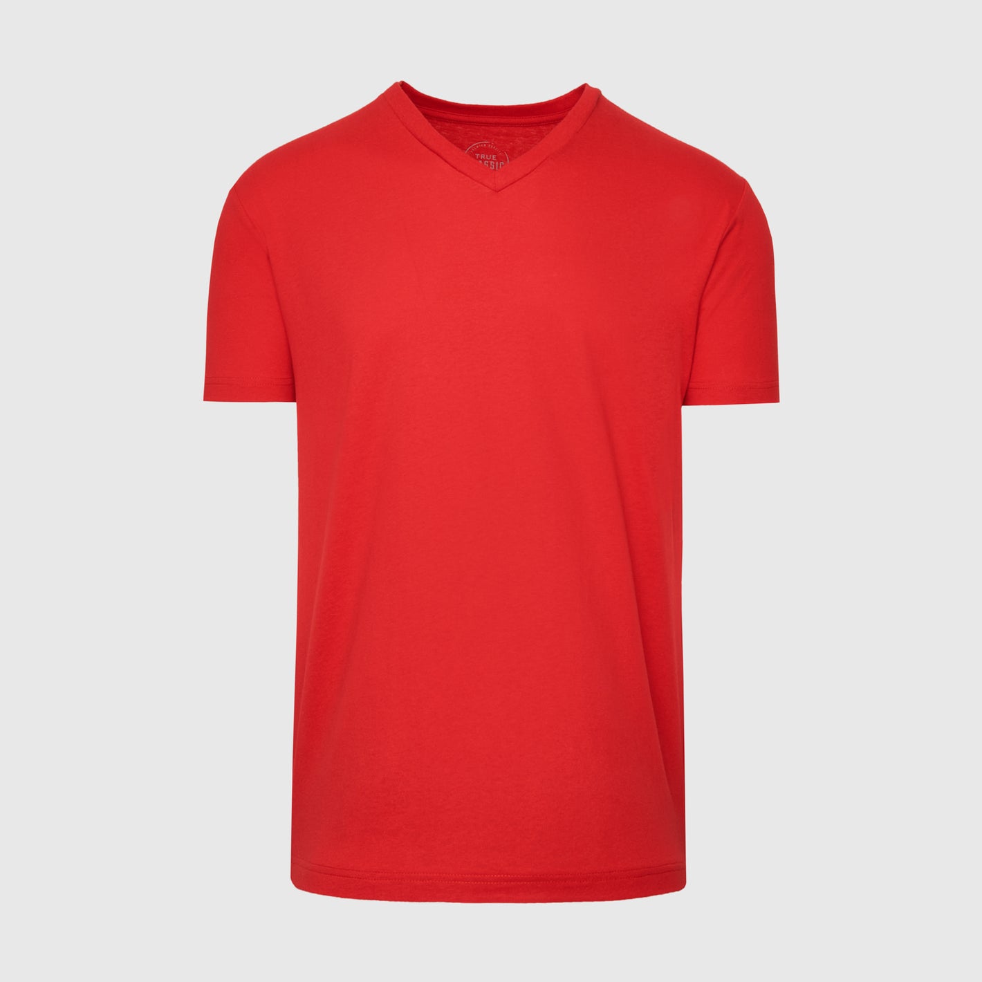 True Red V-Neck Tee against neutral backdrop.