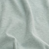 Sage V-Neck Tee close-up showing soft knit texture.