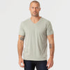 Man wearing Slate Green V-Neck Tee and dark jeans.
