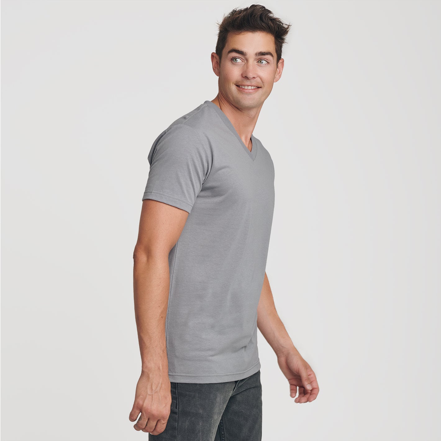 Young man in Slate V-Neck Tee, showcasing fit.