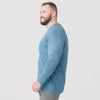 Man wearing Bluestone Long Sleeve Crew Neck Tee and gray pants.