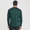 Man in Forest Green Long Sleeve Crew Neck Tee, rear view.