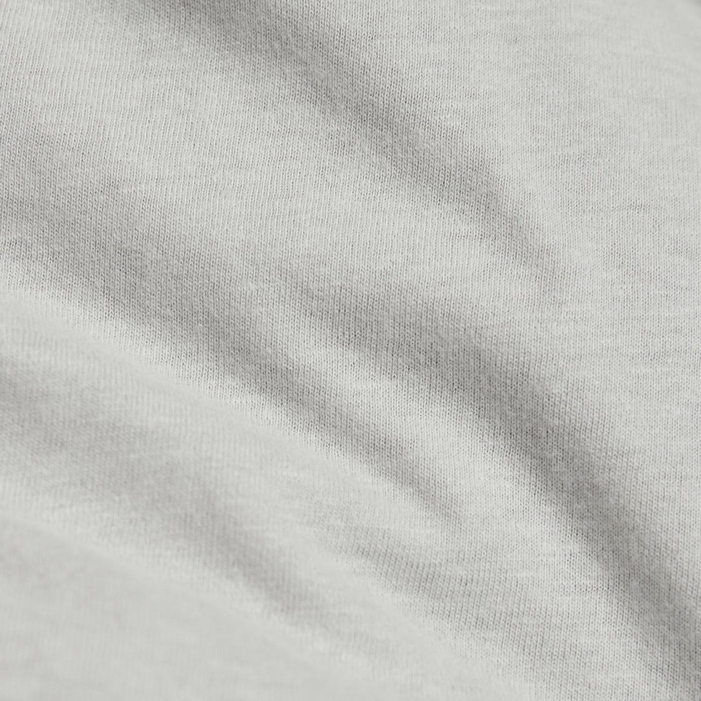 Light Gray Long Sleeve Crew Neck Tee showing fine knit texture.