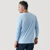 Man wearing Oxford Blue Long Sleeve Crew Neck Tee, side view.