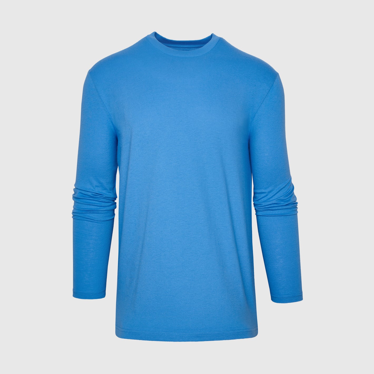 Periwinkle Blue Long Sleeve Crew Neck Tee against neutral background.
