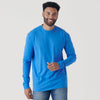 Man in Periwinkle Blue Long Sleeve Crew Neck Tee, smiling.