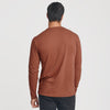 Man wearing Red Rock Classic Long Sleeve Crew Neck, back view.