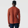 Rust Long Sleeve Crew Neck Tee worn by person facing away.