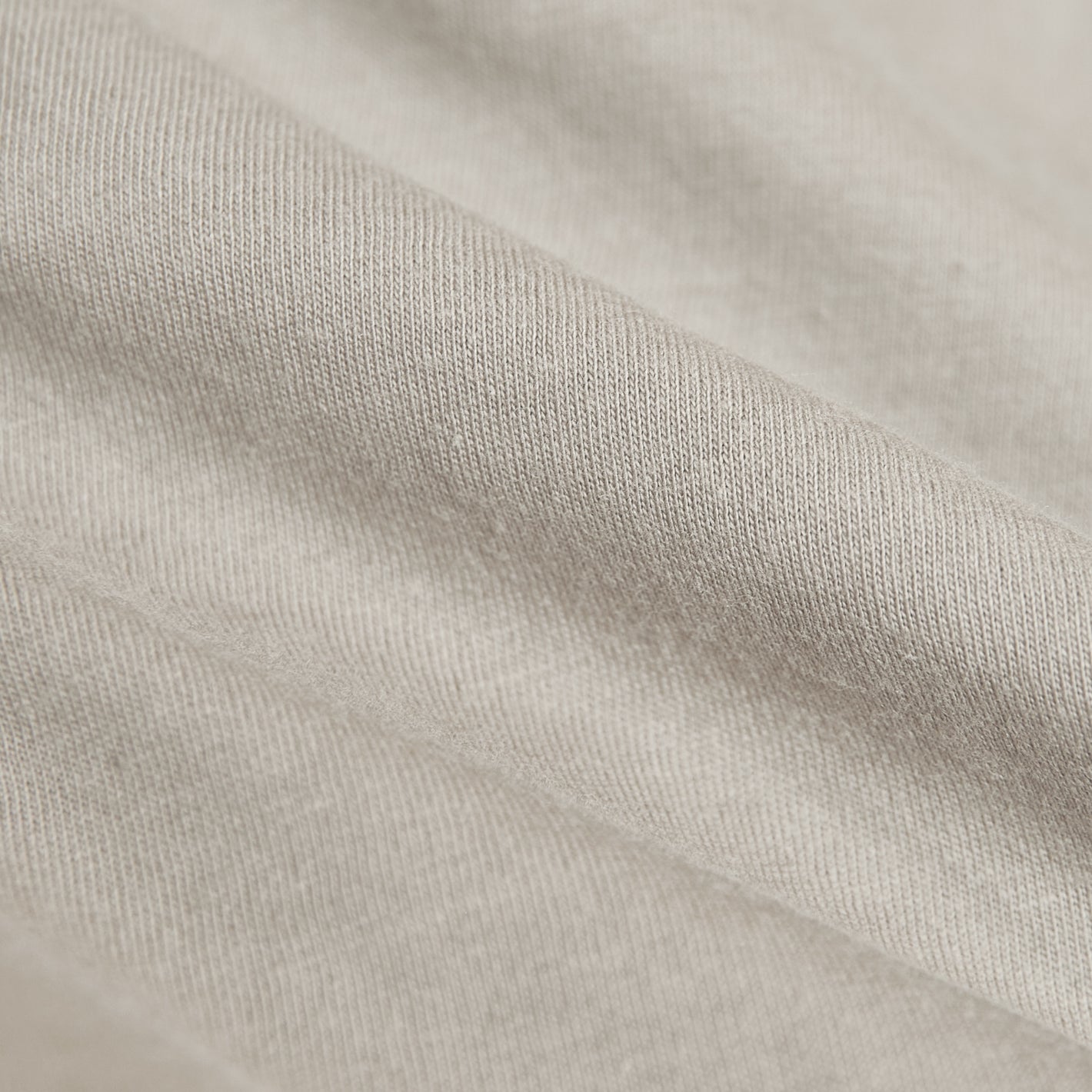 Sandstone Long Sleeve Crew Neck Tee, showcasing soft fabric texture.