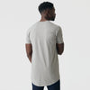 Man wearing Iron Gray Tall Round Hem Crew Neck T-Shirt, back view.