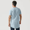 Man in Pale Blue Tall Round Hem Crew Neck T-Shirt.