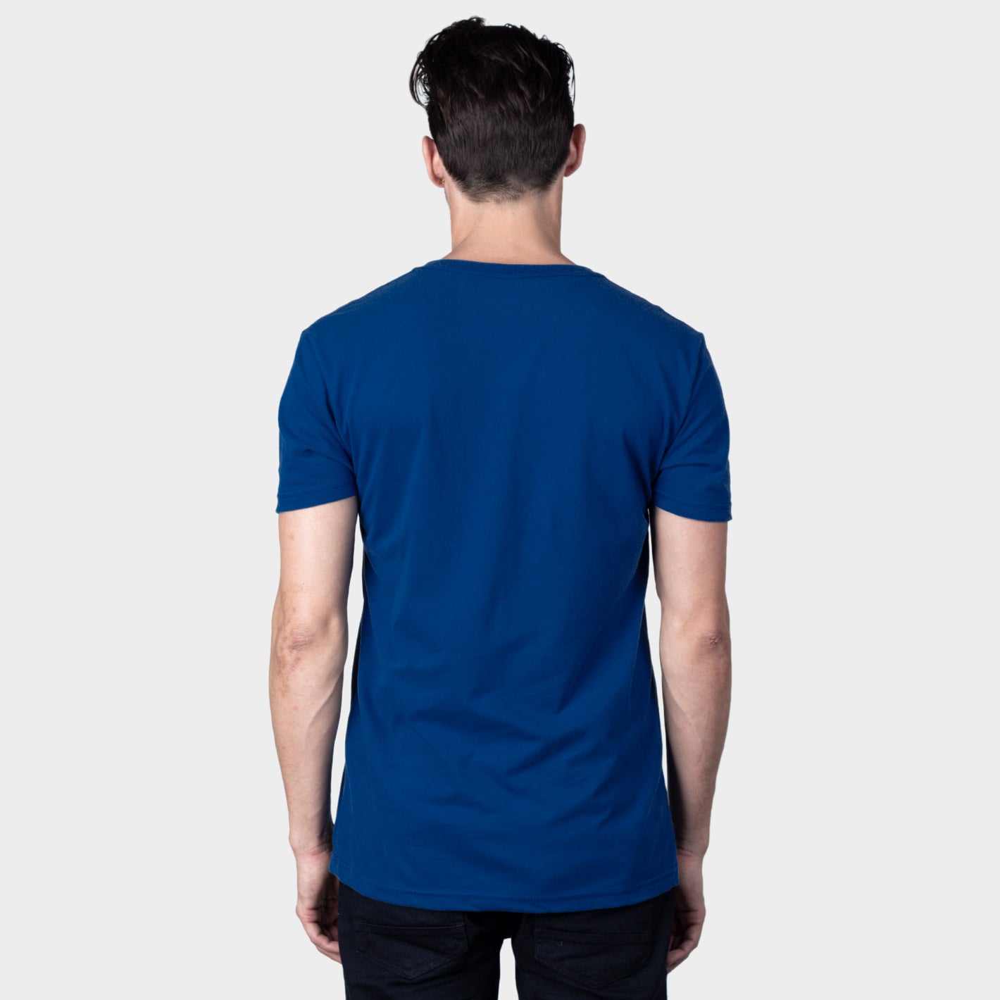 Man wearing Cobalt V-Neck Tee, short-sleeve, crew-neck, facing away.