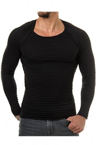 Man wearing athletic fit shirt