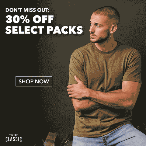 True Classic Tees advertisement of a man, arms crossed, looking off in the distance and text saying: Don't miss out: 30% off select packs, shop now.