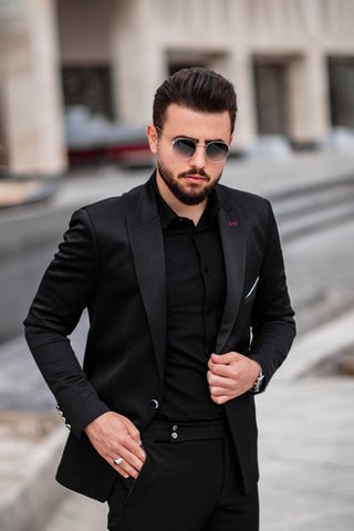Man wearing a True Classic Black T-Shirt With Suit