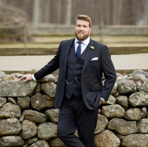 Bearded man wearing a three piece suit